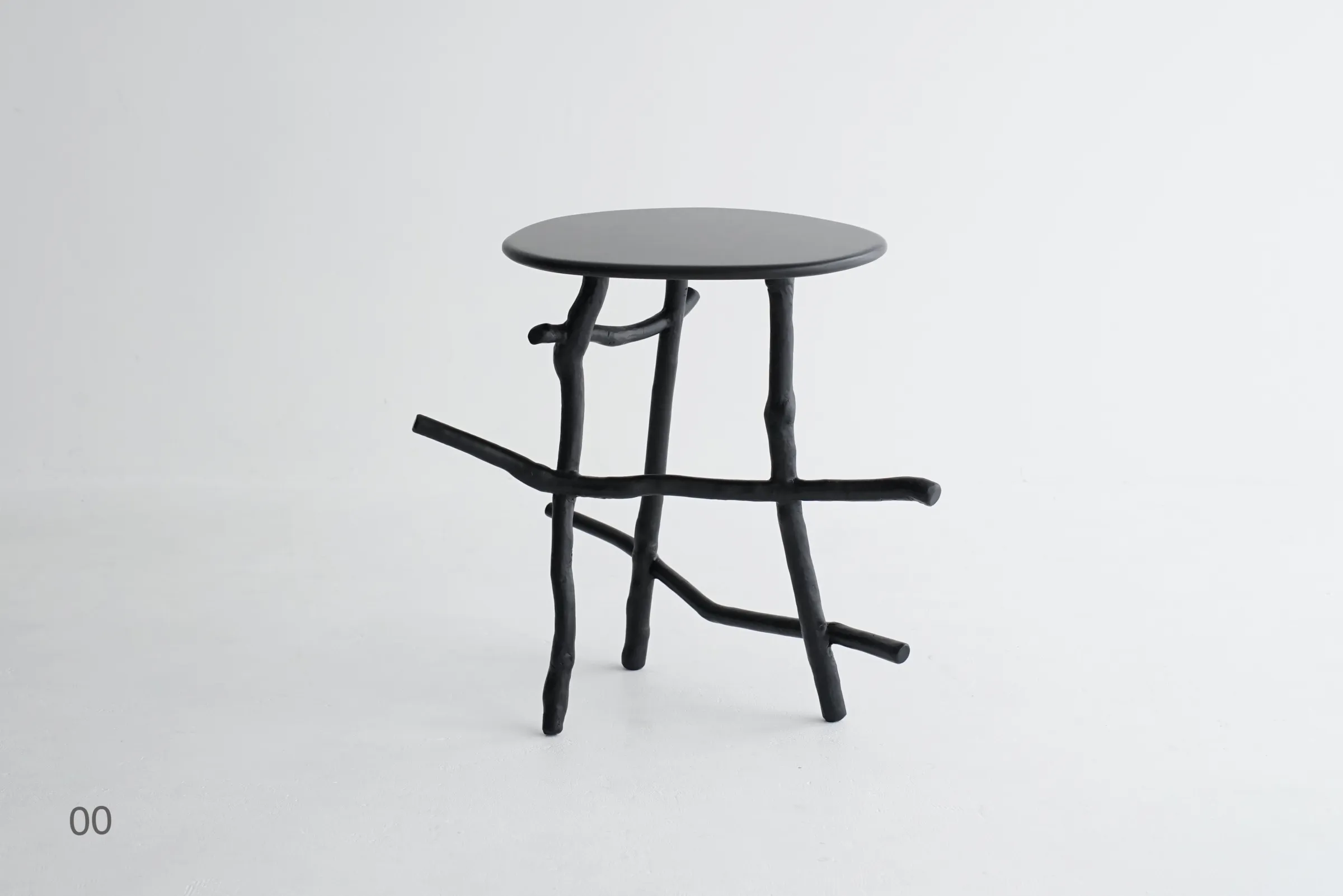 Uneri 00 side table with branch structure showing organic undulating lines by So Tanaka Studio Tokyo